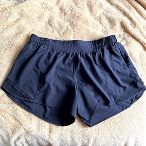 Lululemon black low rise 4” hottie hot shorts